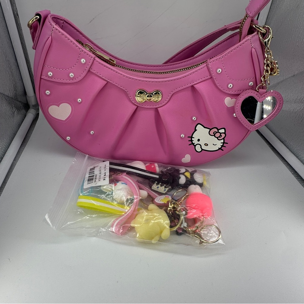 Pink Hello Kitty Shoulder Bag And Keychains From Hot Topic